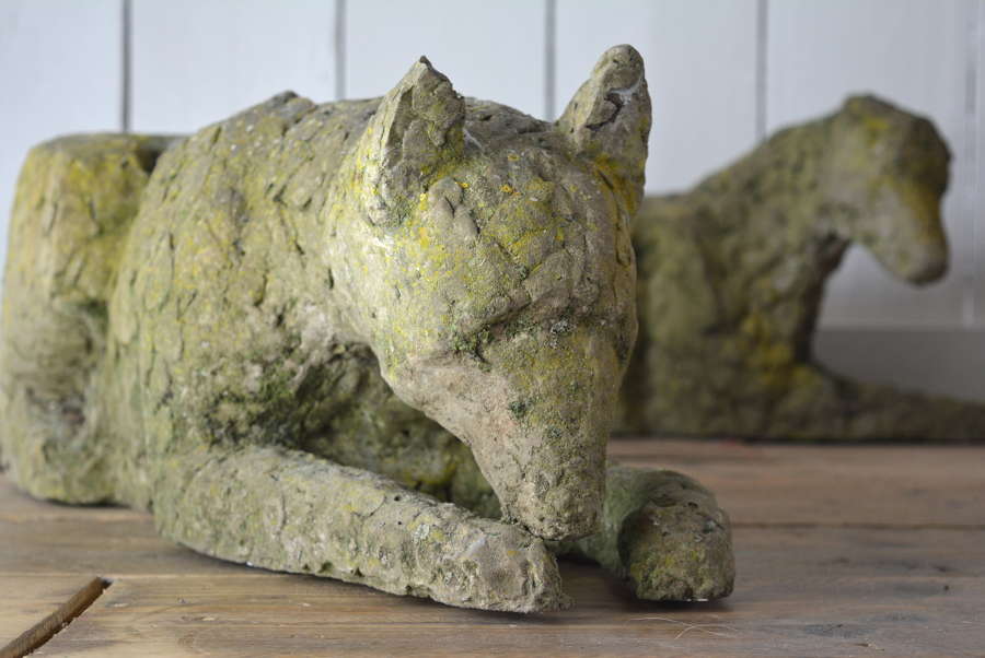 PAIR OF HAND HONED STONE DOGS